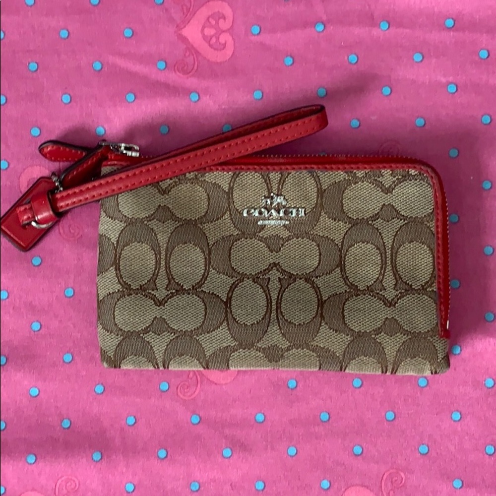 Authentic Coach double zip wristlet.